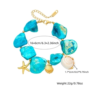 Gold stainless steel turquoise bracelet with starfish, seashell, and conch pendants