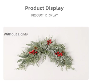 Detail of Christmas PE red berry garland with artificial pine needles and natural cones