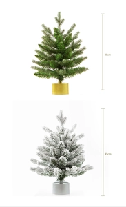 Vertical view of 45cm green and snow-flocked mini Christmas trees with embossed bases