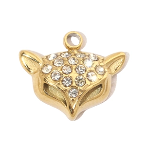 Macro detail of a gold-plated fox head pendant with shimmering inlaid crystal accents