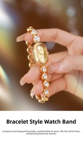 Close-up of BS Bee Sister oval quartz watch with gold bracelet and crystal accents