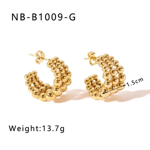 Macro detail of 18K gold plated C-shape bead earrings with 1.5cm size and 13.7g weight