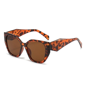 Lunettes de soleil œil de chat oversize avec monture écaille et verres marron