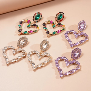Exaggerated oval heart-shaped rhinestone earrings in gold, silver, and purple sets