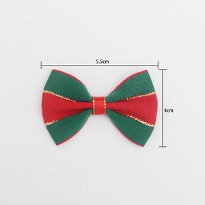 Detailed size view of red and green striped Christmas bow showing 5.5cm by 4cm dimensions