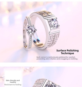 Detail of couple rings showing classic six-prong setting and geometric relief patterns