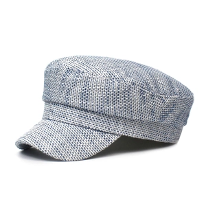 Modern mixed blue tweed military cap for women with flat top and visor outdoors