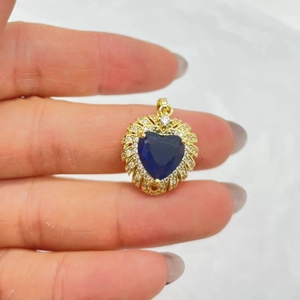 Gold-plated heart pendant with deep blue zircon and sparkling crystal leaf details