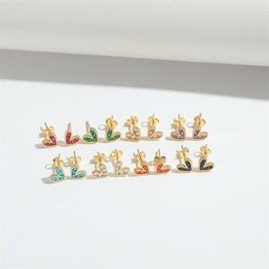 Set of eight pairs of multicolor heart stud earrings with gold plating and cubic zirconia