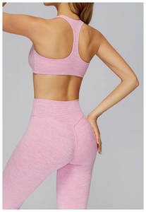 Back view of heather pink racerback sports bra and high-waisted leggings set