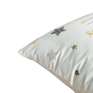 White plush New Year pillow cover with gold foil stars and decorative lettering