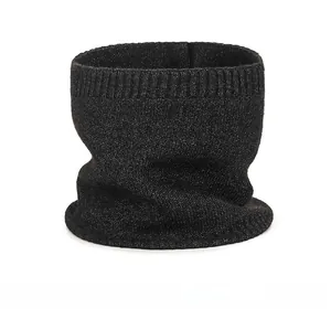 Detail of black core-spun yarn knit neck warmer with grey melange texture for winter