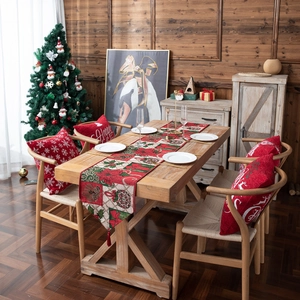 Christmas table runner and pillow covers set with festive poinsettia and snowflake patterns