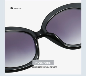 Detailed macro view of ergonomic integrated nose pads on black fashion sunglasses