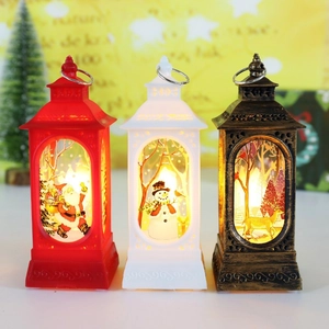 Three LED Christmas lanterns in red, white and bronze with Santa and Snowman designs