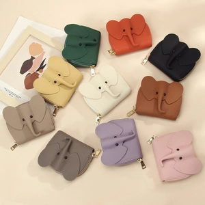 Litchi pattern leather elephant coin purses with golden zippers in various colors