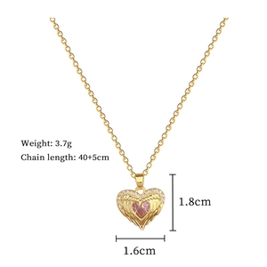Macro detail of pink heart angel wing pendant with 40+5cm chain size specs