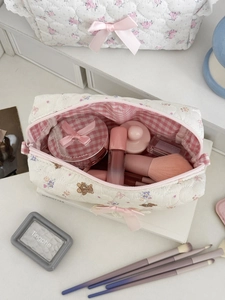 Quilted bear floral storage bag with large capacity showing inner makeup brushes