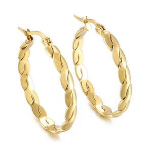 Élégantes boucles d'oreilles créoles torsadées dorées avec texture tressée polie