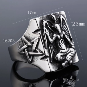 Macro view of vintage stainless steel Baphomet ring with pentagram engravings