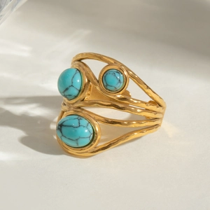 Retro gold stainless steel open ring featuring three natural blue turquoise stones