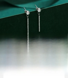 Macro shot of S925 sterling silver tassel earrings with 5A grade zircon hand-set stones