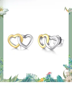 Macro detail of interlocking double heart stud earrings with S925 sterling silver hallmark