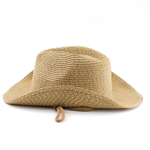 Detail of straw cowboy hat weave texture and adjustable windproof cord on a light brown brim