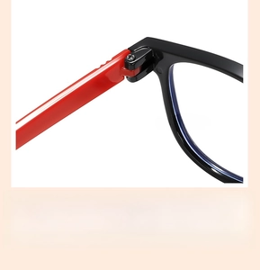 Macro detail of kids' eyewear frame showing the sturdy metal hinge and smooth joint