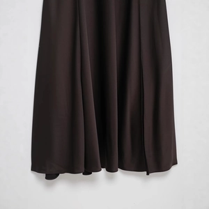 Elegant deep brown satin maxi dress with a smooth draped fabric finish and subtle gloss