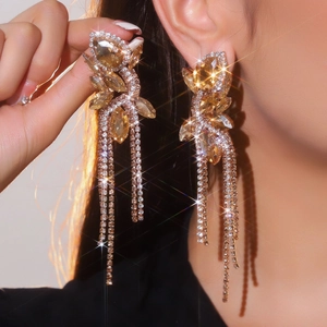 Sparkling crystal bow tassel long earrings with champagne rhinestones for a luxury look