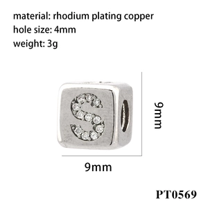 Macro shot of 9mm rhodium-plated letter S cube charm with cubic zirconia and 4mm hole