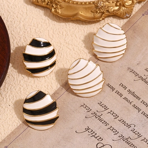French vintage 18K gold plated oval stud earrings with black and white enamel sail pattern