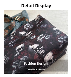 Detail of gothic nylon bucket bag featuring skull and floral prints with patterned strap