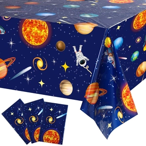 Space-themed disposable tablecloth and napkins with astronauts and planets for boy's birthday
