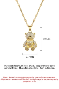 Macro view of crystal bear pendant with dimensions showing 2.8cm height and 2.7cm width