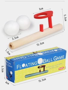 Detailed dimensions of wooden floating ball game including 15.5cm length and ball size