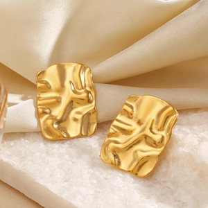 18K gold plated rectangular earrings with crumpled texture on white rock and silk