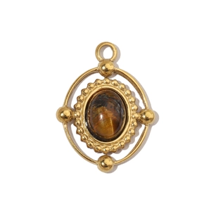 Detailed close-up of a retro gold stainless steel pendant with tiger eye stone inlay
