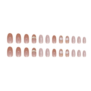 Daisy cat-eye nail set with pink glitter and 3D pearls for a sweet feminine look