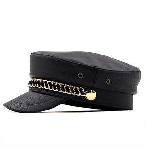 Classic black faux leather newsboy cap with gold chain accent and metal side vents
