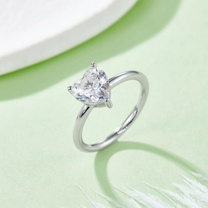 Elegant 2 carat heart-cut moissanite sterling silver ring with minimalist silver band