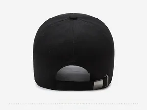 Close-up of the back of the black cotton baseball cap showing the adjustable metal buckle