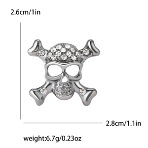 Sparkling silver skull brooch with rhinestones for punk fashion and Halloween accessories