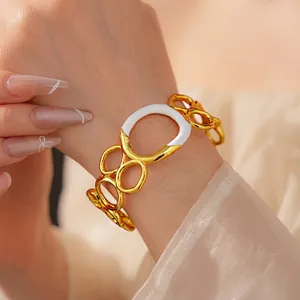 Elegant gold chain bracelet with white enamel oval detail for women stylish modern jewelry