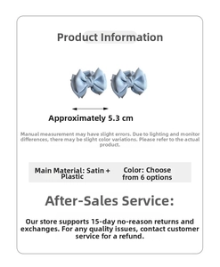 Detail showing 5.3cm light blue satin bow hair clips with double-layered fabric texture