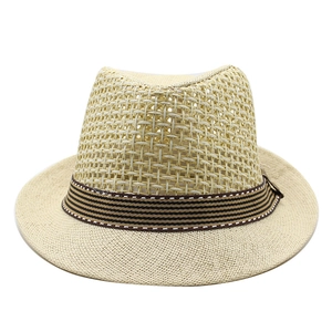 Beige straw Panama sun hat with hollow mesh weave and dark brown ribbon detail
