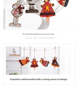 Detailed view of hand-painted wooden gingerbread man and reindeer Christmas ornaments