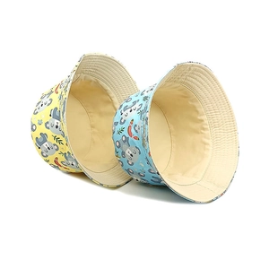 Kids reversible bucket hat with cute koala and rainbow prints in yellow and blue colors