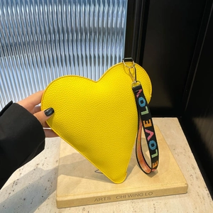 Yellow heart-shaped textured leather handbag with colorful LOVE embroidered wide strap